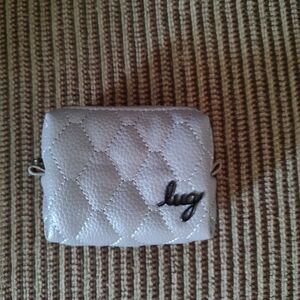 lug Quilted Cream Wristlet Clutch with Logo Accent